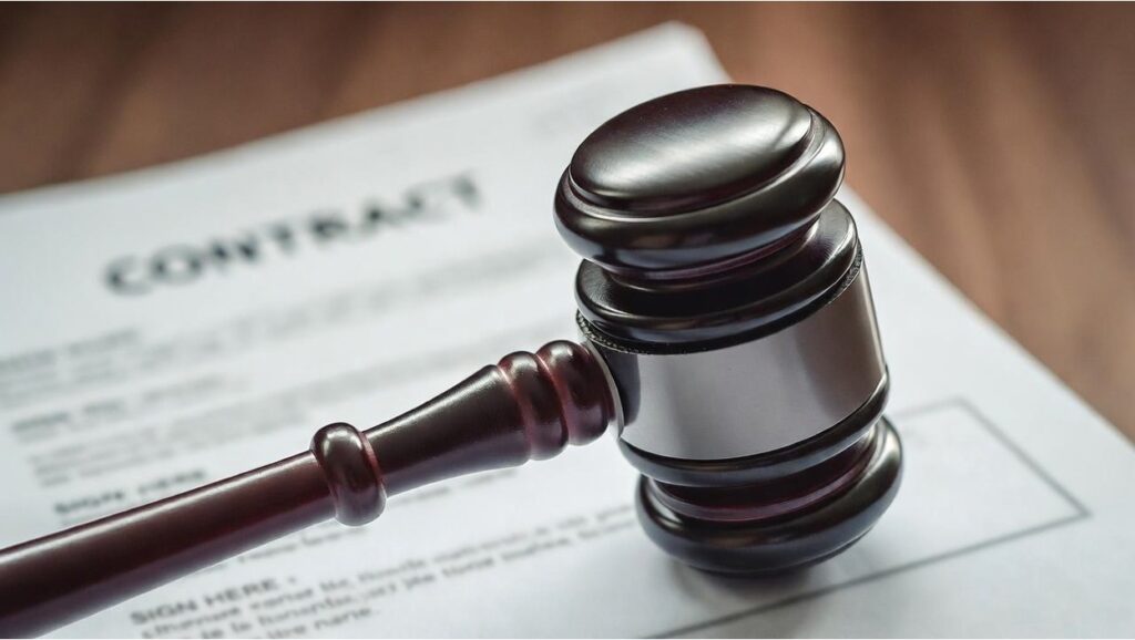 Gavel resting on a contract document