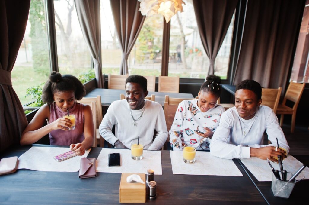 A family reviewing estate planning documents together at a table.