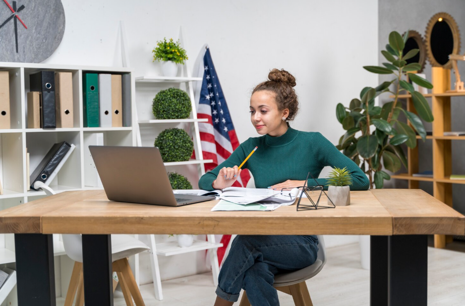 Person working in the United States, representing the unrestricted employment access granted to non-citizen nationals.