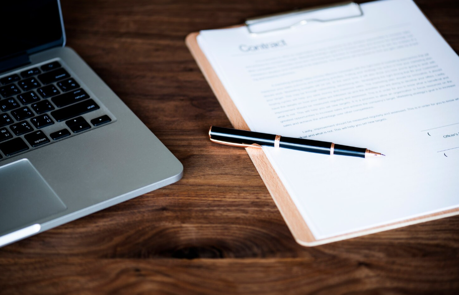 LLC formation documents and operating agreement on a desk.