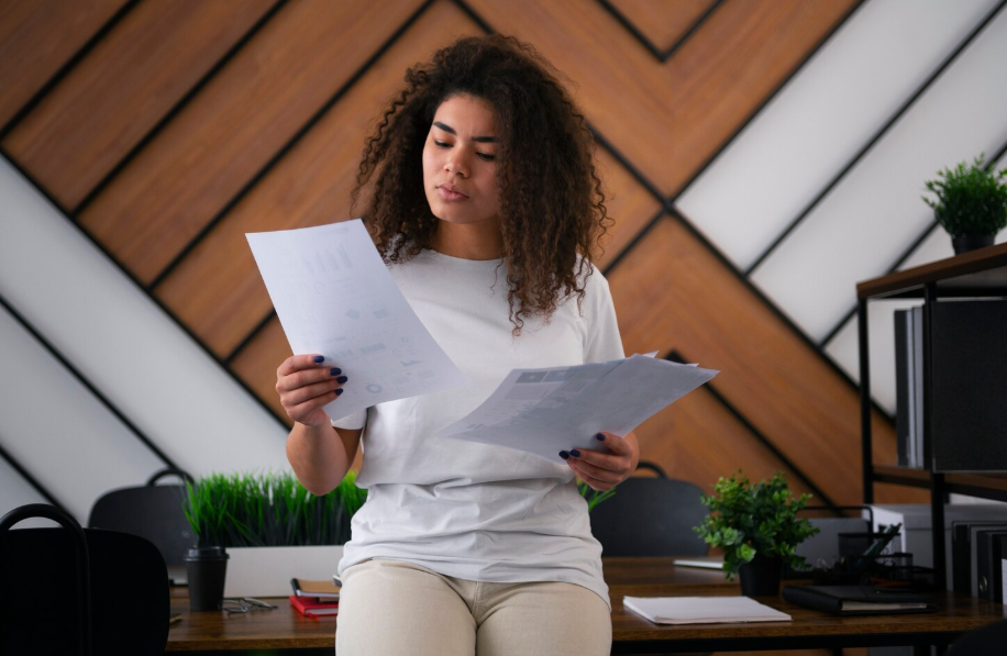 A business owner reviewing financial documents.