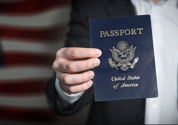 A person holding an American passport.Â