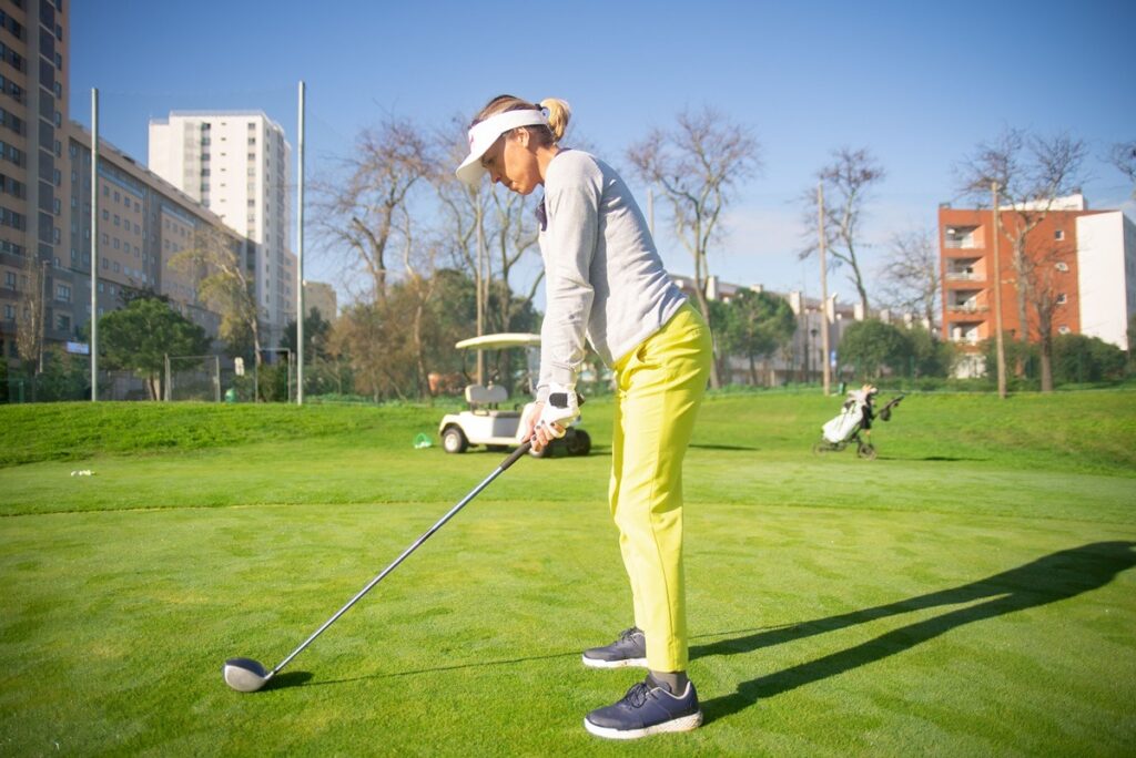 A golfer at a private member club, a common example of a 501(c)(7) social organization.