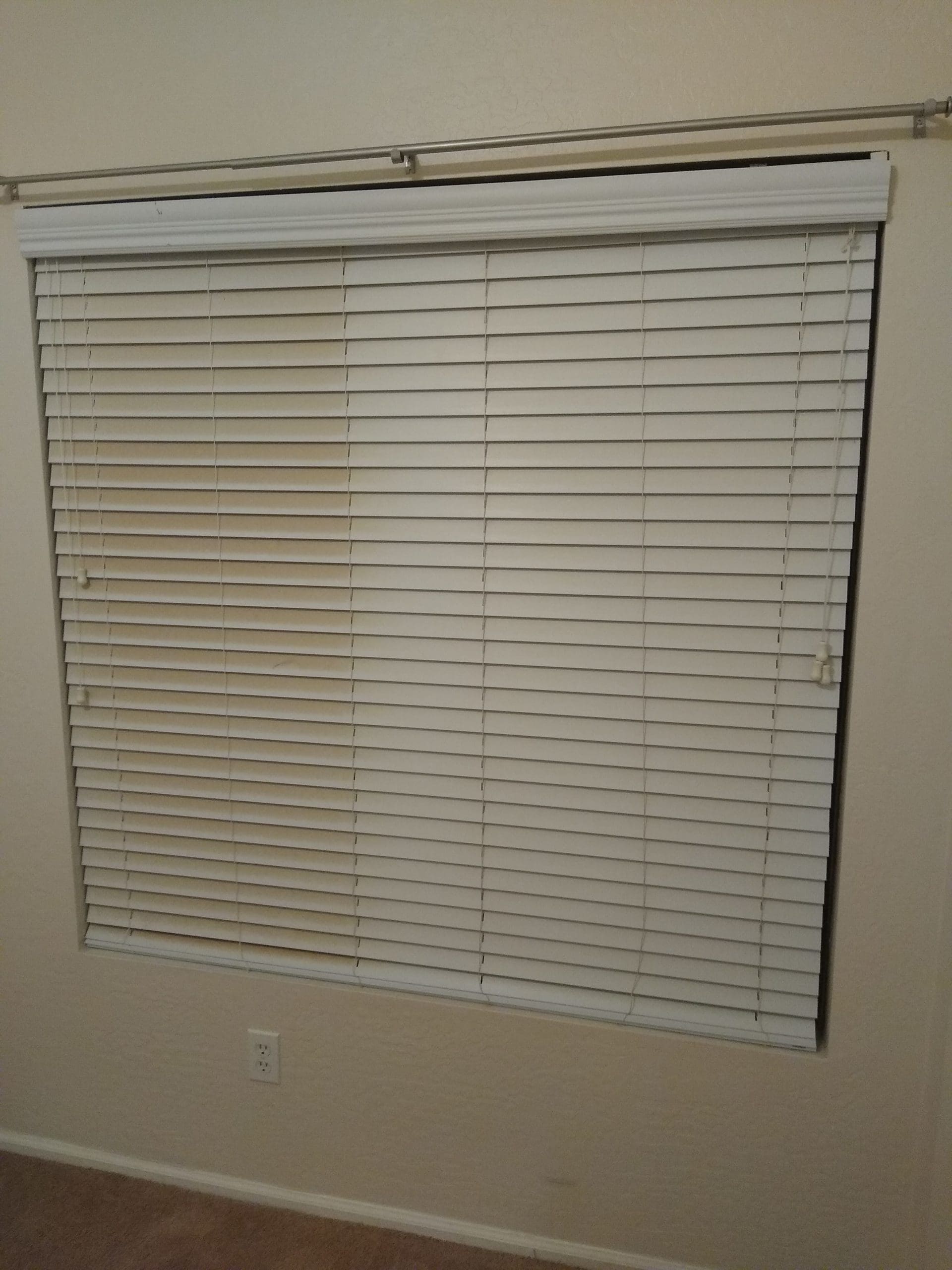 Before and after cleaned window blinds